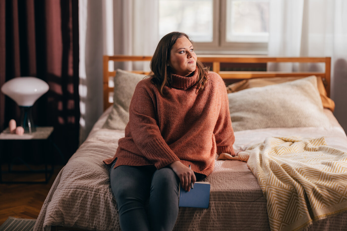 Woman seated comfortably at home